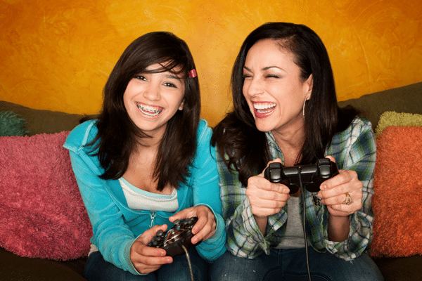 mother-and-daughter-playing-video-games